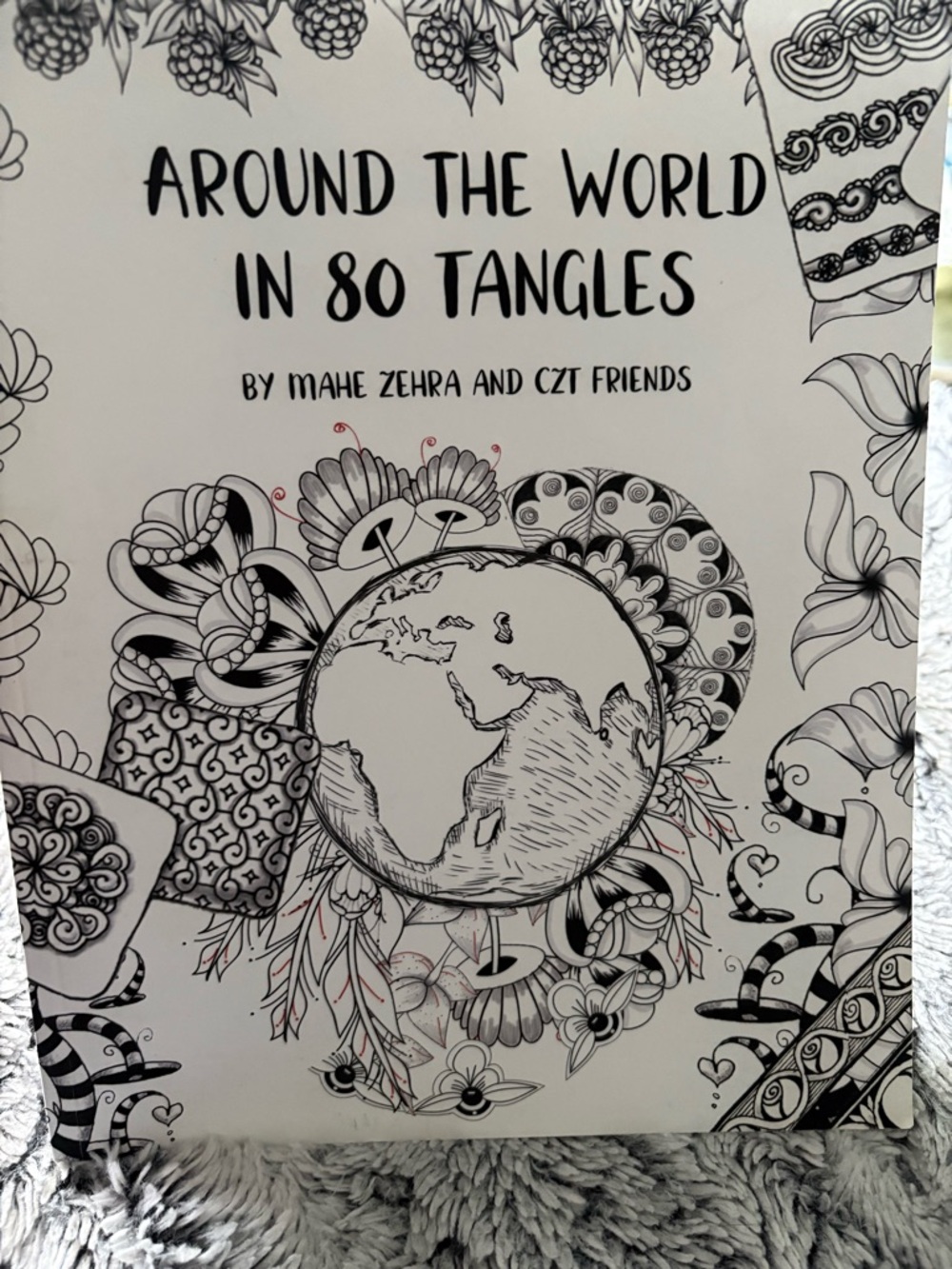 Around the World in 80 Tangles
